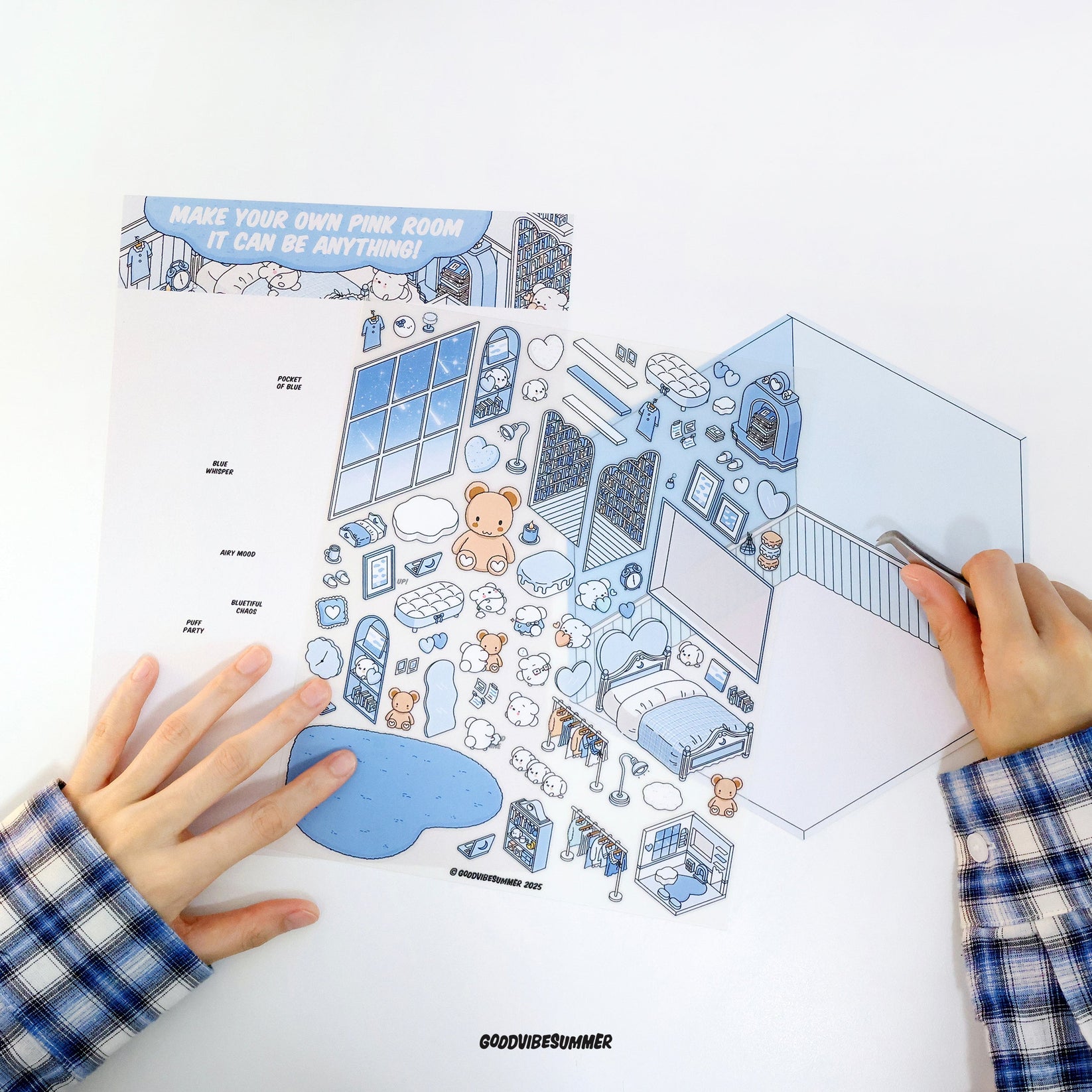 A child and parent building a sticker world together